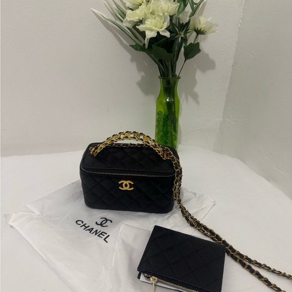 CHANEL Handbags - Chanel Black Quilted Bag with Gold Chain